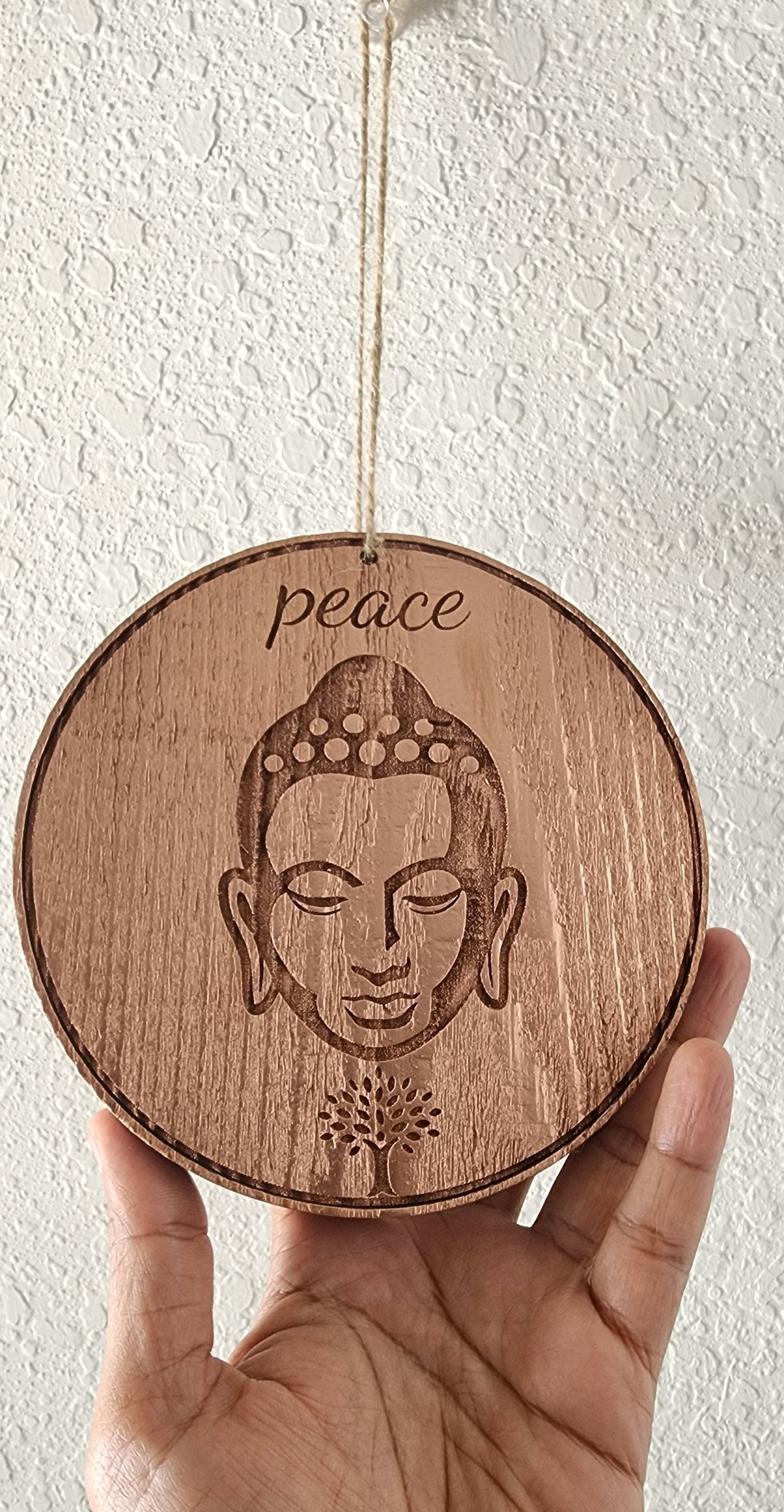 Circular Wooden Buddha Art Engraved with Metallic Copper Finish